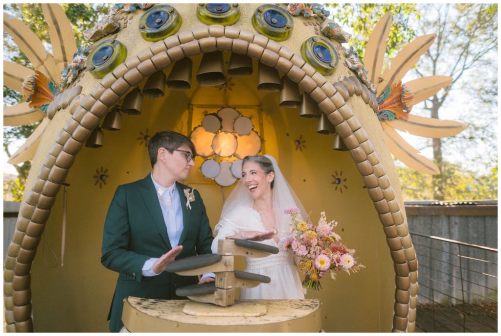 At the Music Box Village wedding, the couple plays percussion instruments