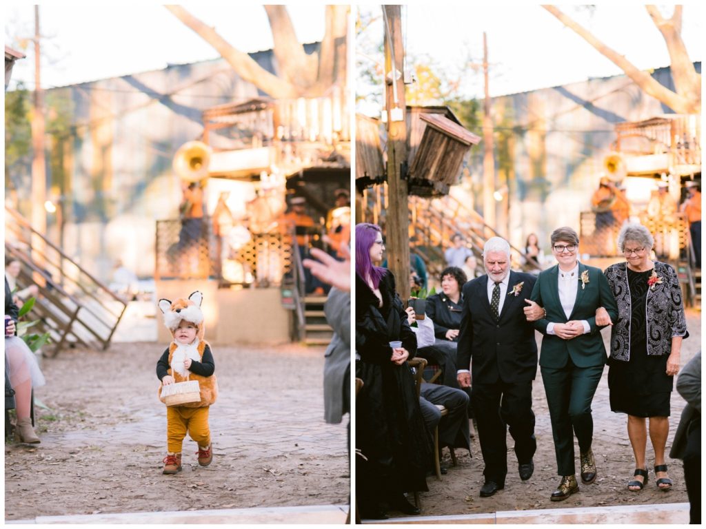 A child dressed as a fox precedes Jen up the aisle of the Music Box Village wedding