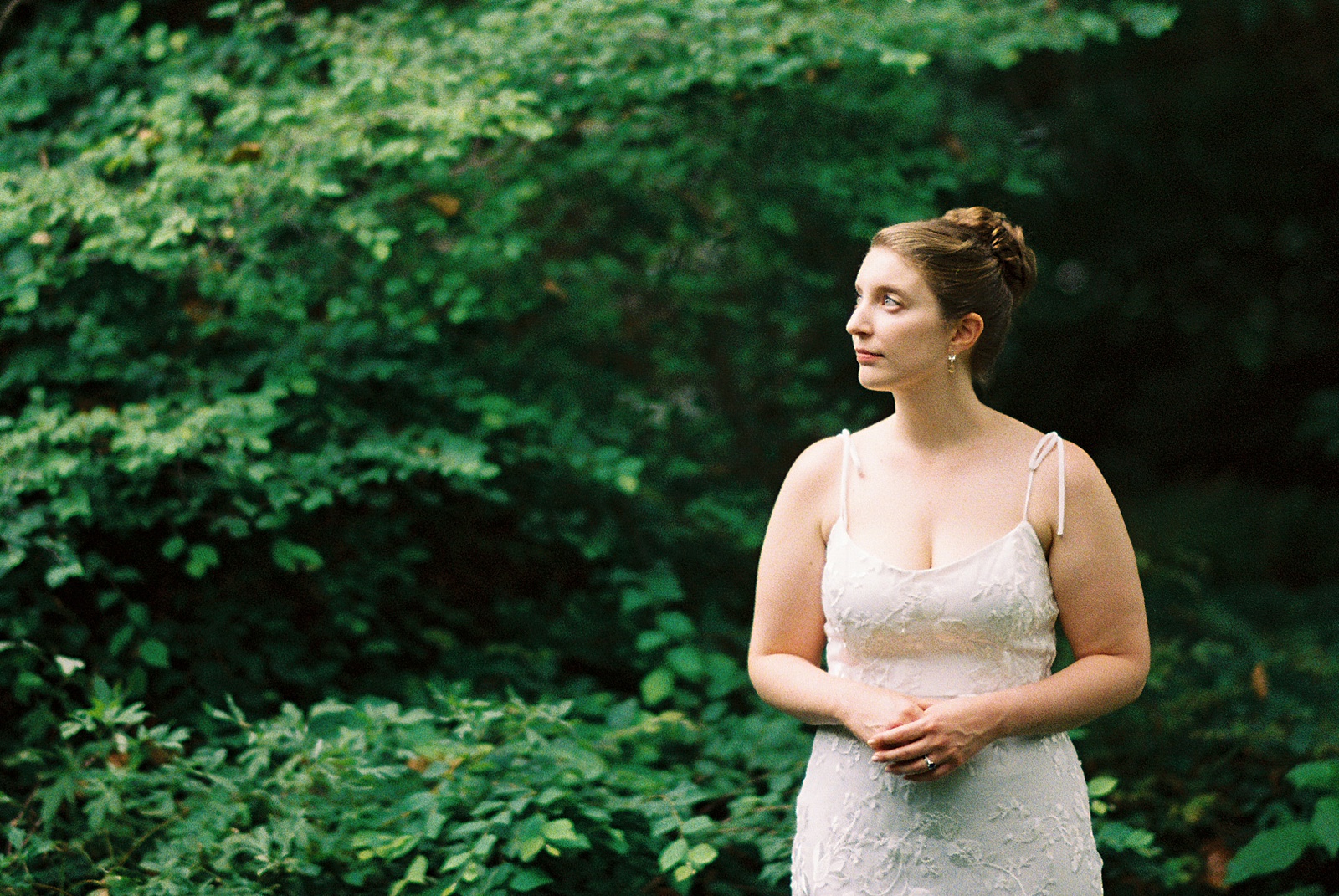 A Philadelphia bride poses for film wedding photography after her elopement.