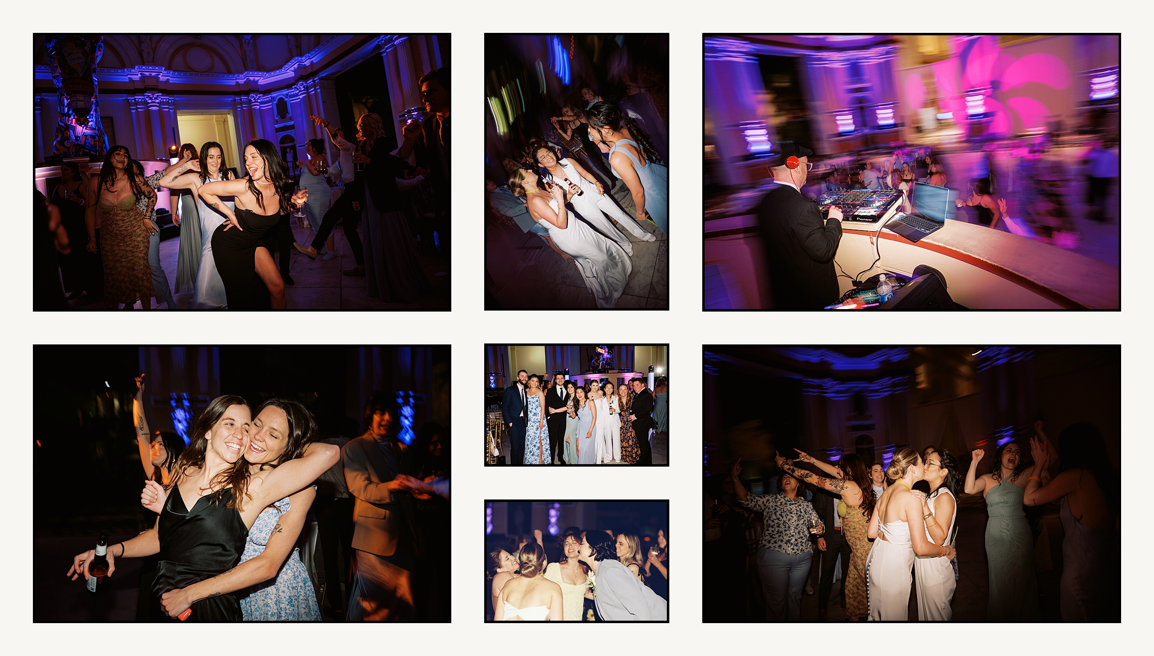 Wedding guests dance around two brides at a colorfully-lit wedding receptions.