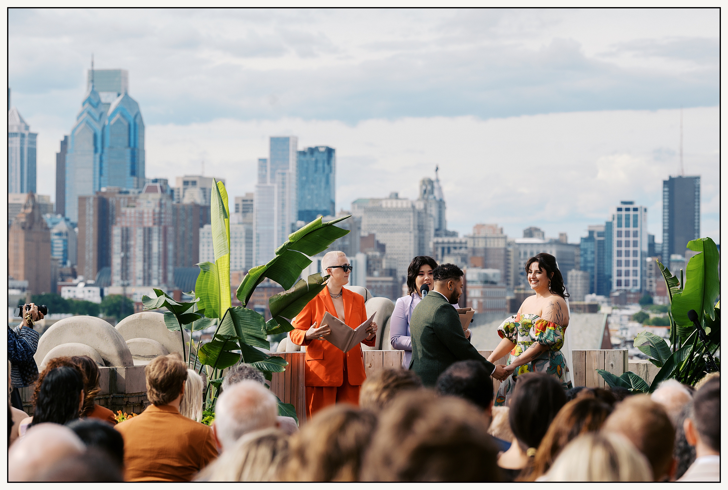 A ceremony takes place on the rooftop of a Philadelphia wedding venue.